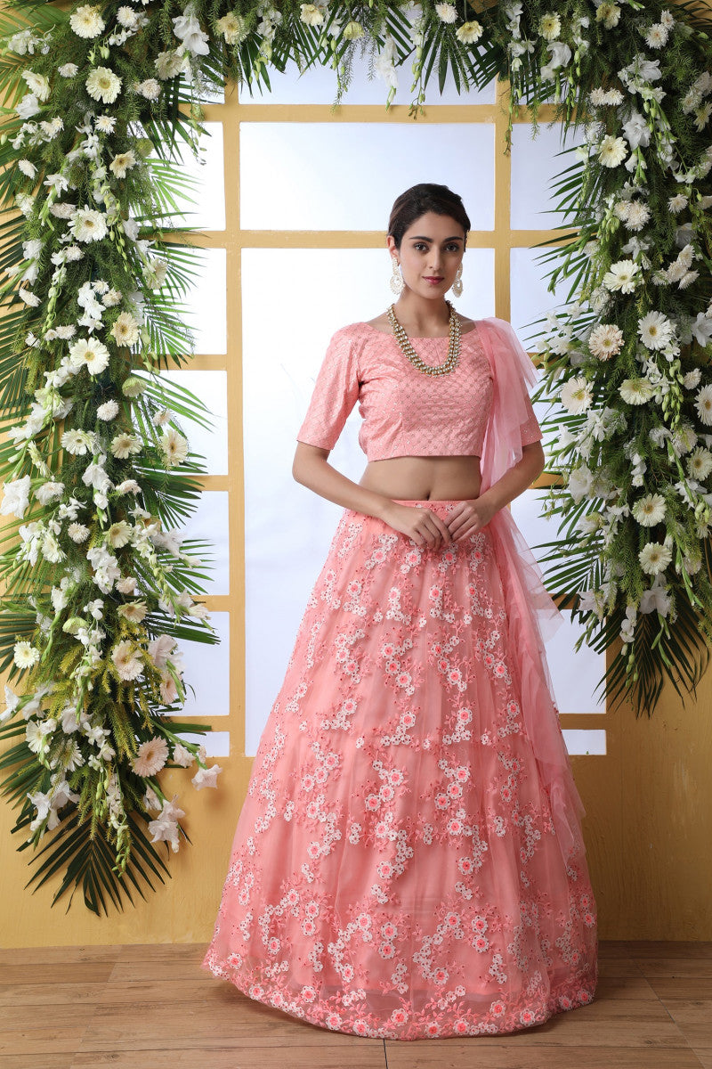 Adorable Peach Net Extra Ordinary Lehenga Choli