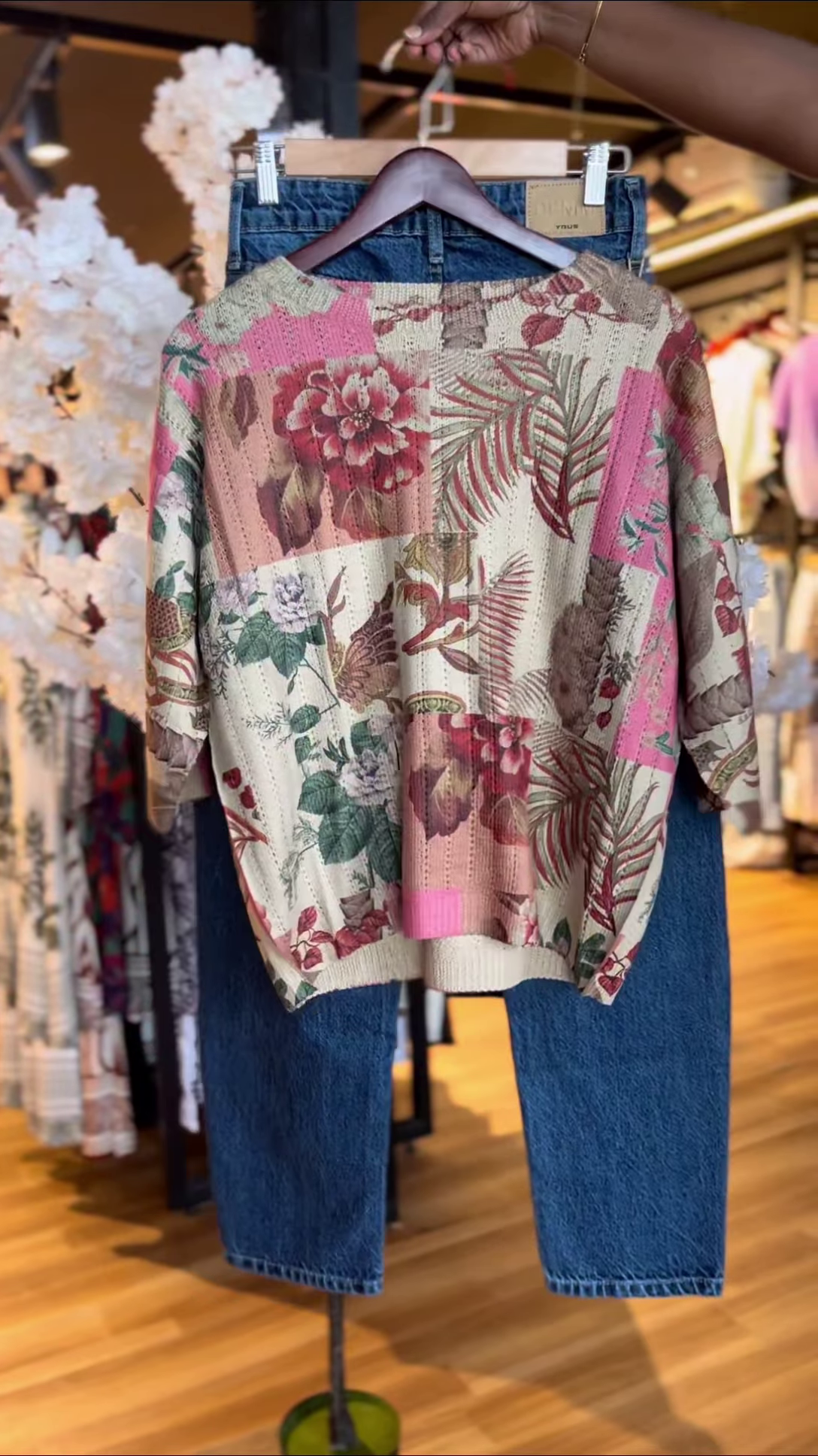 Women’s Patchwork Floral Print Sweater with Blue High-Waisted Jeans – Casual Boutique-Inspired Ensemble